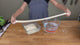 cheesemaker stretching string cheese