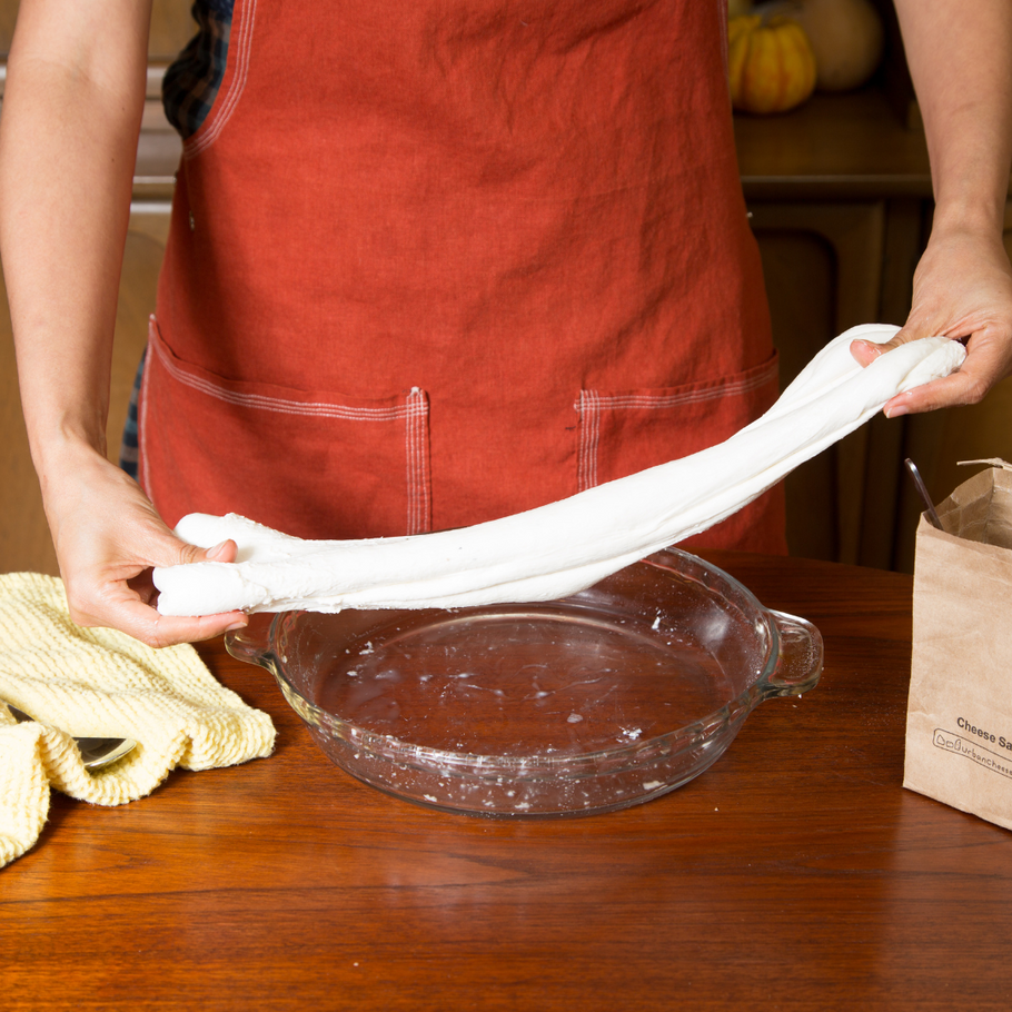 cheesemaker claudia lucero stretches mozzarella and burrata curd in private cheese-making class